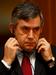 Gordon Brown posluša Amy Winehouse