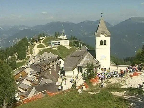 What may at first glance appear to be just another mountaintop in the Italian part of the Julian Alps, not far from the border with Slovenia, happens to be one of the most important pilgrimage destinations for the Slovenian people - and an important gathering place for people from far and wide. Foto: MMC RTV SLO