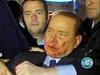 Video in foto: Protestnik udaril Berlusconija