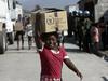 Foto: Haiti se še trese, svet pa še razpravlja o obnovi