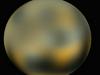 Uganka astronomov: Zakaj je Pluton vse bolj rdeč?