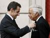 Foto: Sarkozy pripel zvezdo na prsi Ralpha Laurena