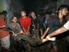 Foto: Ognjeni zublji v Bangladešu pogoltnili najmanj sto žrtev