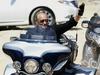 Foto: Putin s konja presedlal na legendarnega Harleyja Davidsona