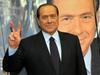 Po večerji, striptizu in dotikanju si je Berlusconi izbral dekle