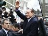 Berlusconi stopil pred sodnika v primeru Mills