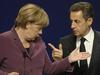 Merklova in Sarkozy: Evro je pomembnejši od reševanja Grčije