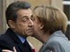 Pred vrhom EU-ja Merklova optimistična, Sarkozy previden
