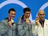 Phelps odbil napad Lochteja in osvojil 20. olimpijsko medaljo