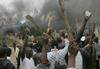 V spopadih v Keniji več deset zažganih in razsekanih