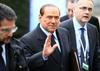 Berlusconi se vrača z napovedjo kandidature za premierja