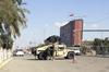 V eksplozijah v Bagdadu ubitih 33 ljudi