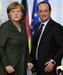 Merklova in Hollande za sankcije proti Ukrajini in evropski davek na transakcije