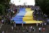 Merklova in Hollande pozivata k prekinitvi ognja na vzhodu Ukrajine