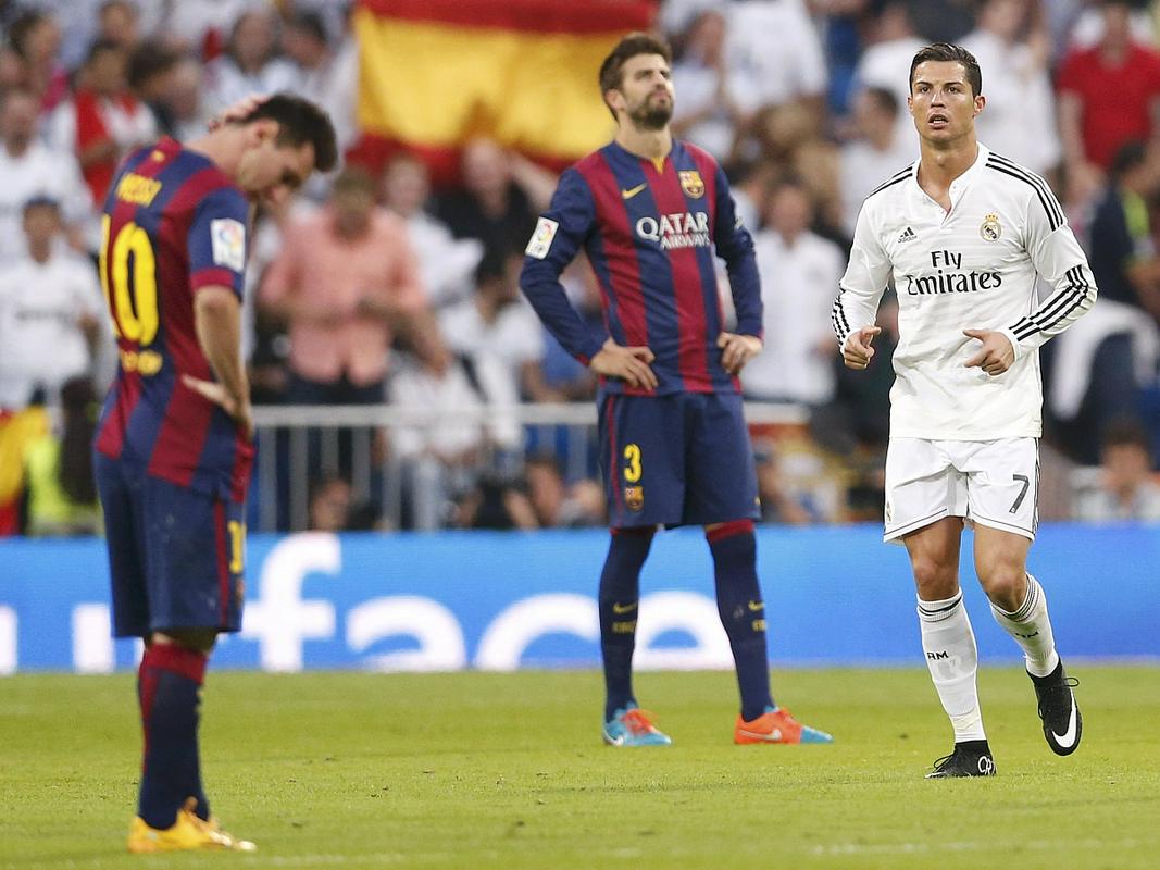 Lionel Messi in Gerard Pique - Cristiano Ronaldo. Foto: Reuters