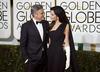 V VB so se o sankcijah proti Putinu posvetovali z zakoncema Clooney