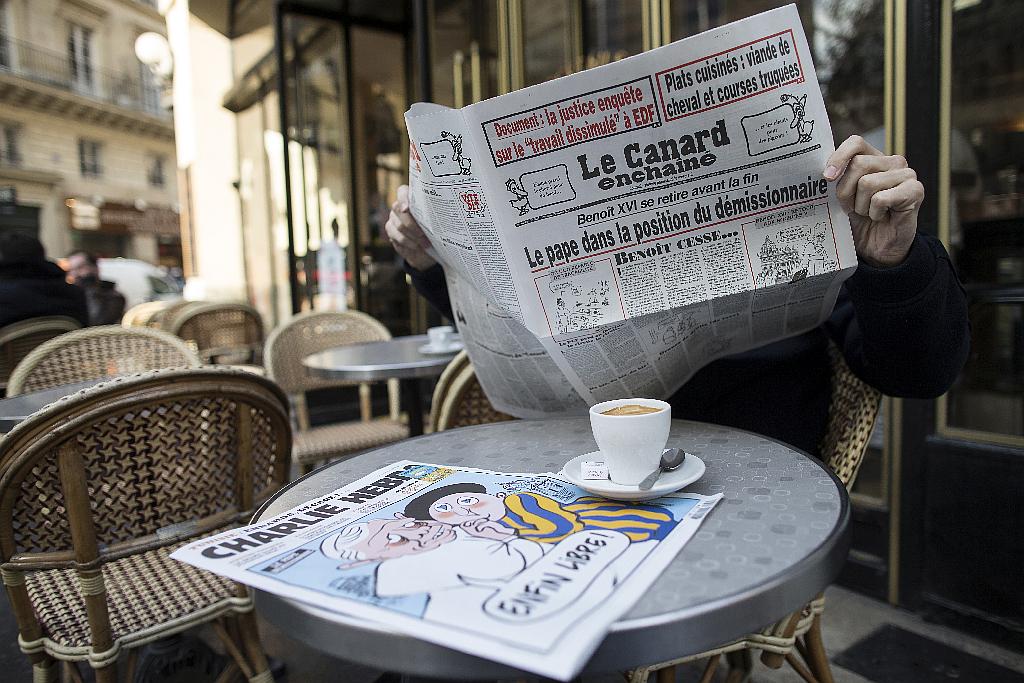 Osrednji francoski satirični tednik je Le Canard Enchaîné, ki mu je prodaja od leta 2007 zrasla za tretjino, vsak teden pa se proda v okoli 700.000 izvodih. Foto: EPA