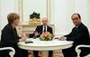 Merklova in Hollande sta predlog mirovnega načrta predstavila Putinu