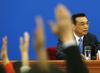 Kitajski premier napoveduje manj države in več trga