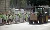 Foto: Traktorji pred vlado v protest umestitvi hitre ceste