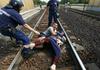 Foto: Begunce z vlaka namesto v Avstrijo odpeljali v azilni center