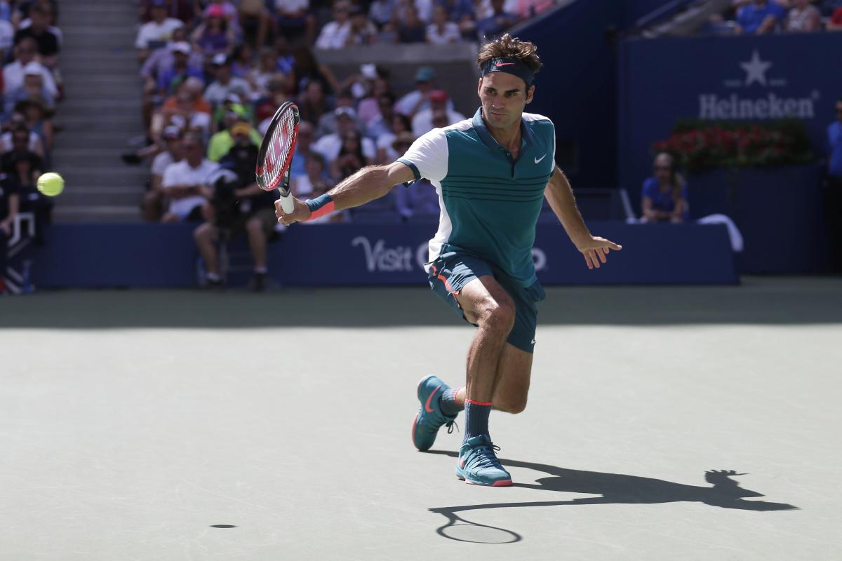 Roger Federer se je prebil v drugi teden brez izgubljenega niza. Foto: EPA