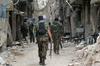 Sirski uporniki na jugu Damaska ostajajo ujeti v obroču vladnih sil