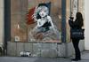 Banksyjeva obsodba francoskega ravnanja z begunci v Calaisu