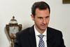 Asad: Petletna vojna Sirijo stala 200 milijard dolarjev
