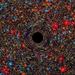 Astronomi v vesolju našli ogromno črno luknjo