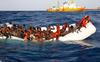 Italija bo Libiji za ustavitev prebežnikov podarila 12 ladij