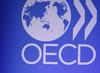 OECD Sloveniji še vedno napoveduje gospodarsko rast, a nižjo kot prej