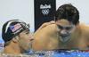 Phelpsu le srebro na 100 m delfin, Schooling zmagal z olimpijskim rekordom