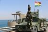 Sirska vojska naj bi bombardirala kurdske položaje