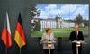 Češka Angeli Merkel: Podpora skupni vojski in ne begunskim kvotam