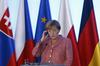 Angela Merkel v Varšavi pozvala k enotnosti EU-ja po brexitu