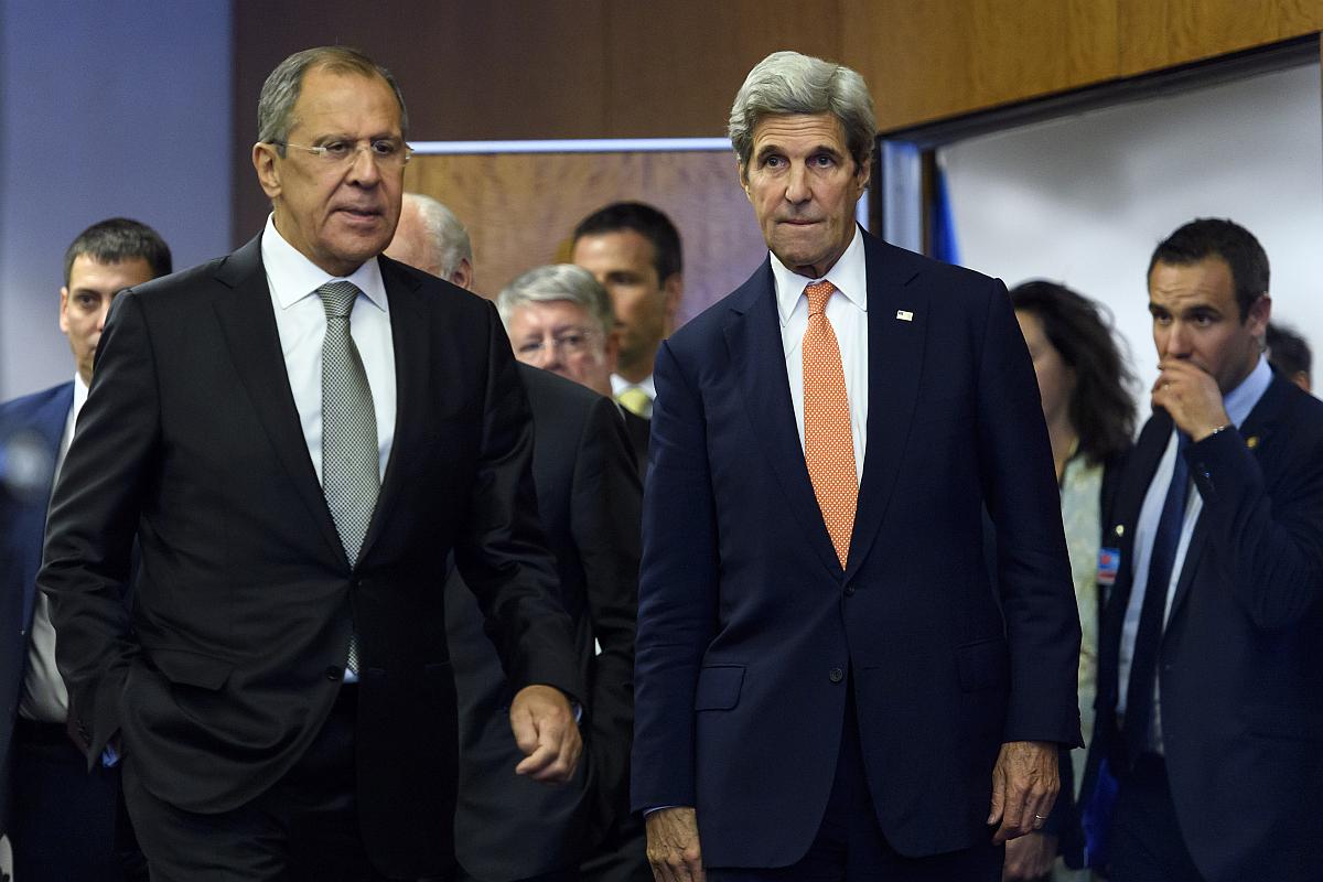 Sergej Lavrov in John Kerry.