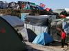 Hollande napovedal zaprtje begunskega taborišča v Calaisu