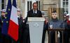 Hollande na slovesu za ubitim policistom pozval k enotnosti v boju proti terorizmu