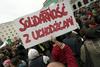 Poljska kljubuje tudi po opozorilu: Beguncev ne bomo sprejeli