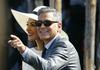 Clooney zaradi fotografij dvojčkov napoveduje tožbo