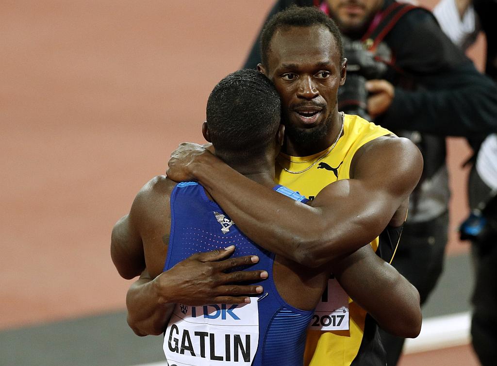 V finalu teka na 100 m je slavil Justin Gatlin, Usain Bolt se mora zadovoljiti z bronom. Foto: Reuters