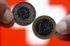 V DZ vložen predlog zakona za pretvorbo posojil v švicarskih frankih