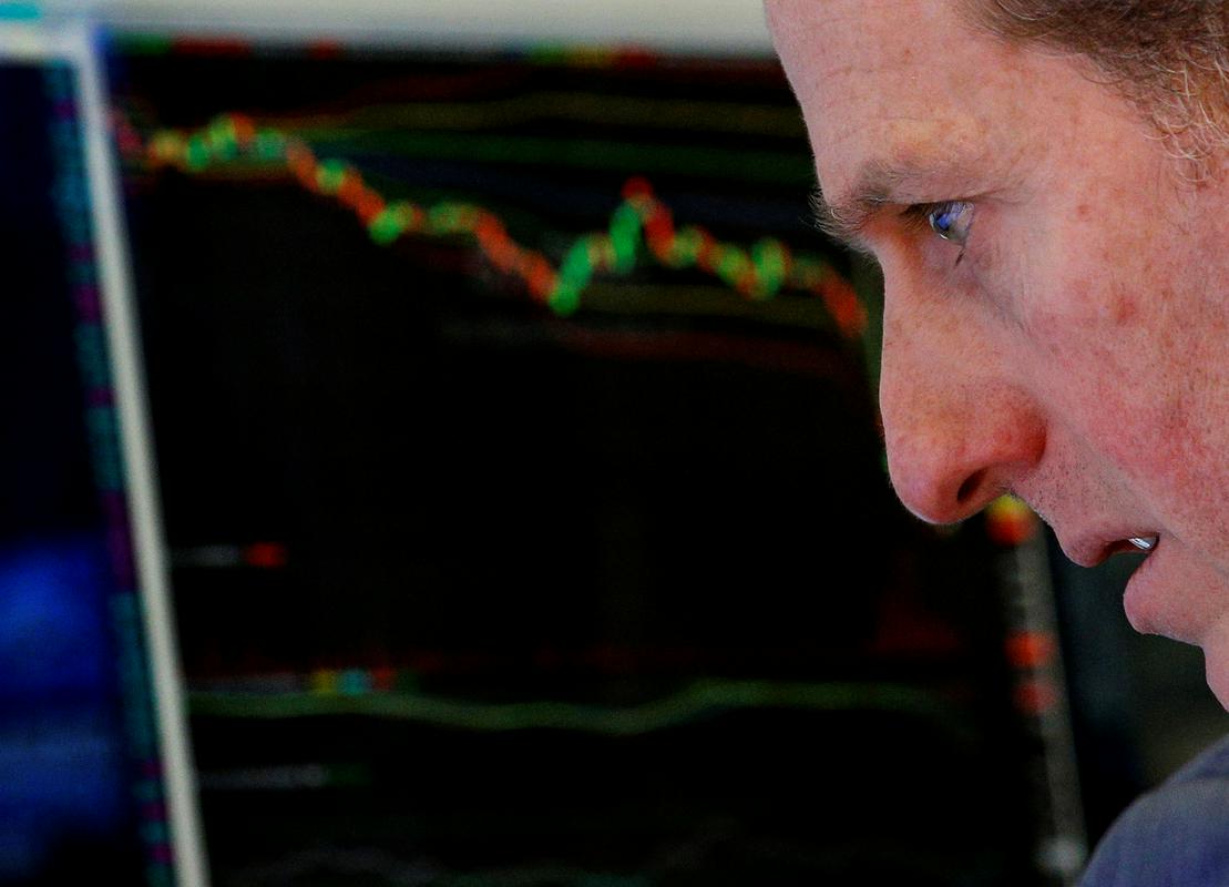 Dow Jones se je sredi torkovega trgovanja povzpel do 28.575 točk oziroma za več kot odstotek. Dan je konča pri 28.308 točkah (+0,4 %). Foto: Reuters