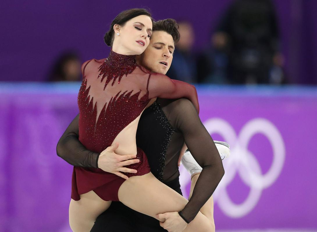 Tessa Virtue in Scott Moir sta v Pjongčangu v dveh nastopih osvojila dve medalji, s čimer sta svoj karierni izkupiček popravila na pet nastopov in pet medalj. Foto: Reuters