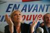Marine Le Pen zaradi objave nasilnih dejanj IS-ja grozi zapor