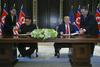Trump in Kim napisala zgodovino - od rokovanja do podpisa dogovora