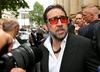 Nicolas Cage se je naposled poslovil od zakona z Eriko Koike