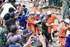 Število žrtev porušene stavbe v Kambodži naraslo na 24