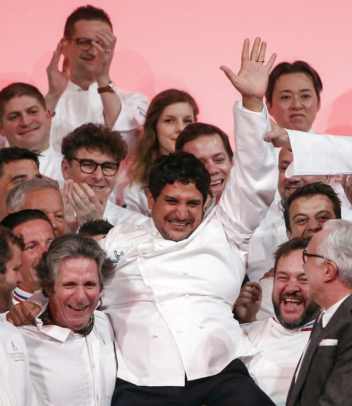 Veselje Colagreca in kolegov ob prejemu tretje Michelinove zvezdice januarja letos. Foto: AP